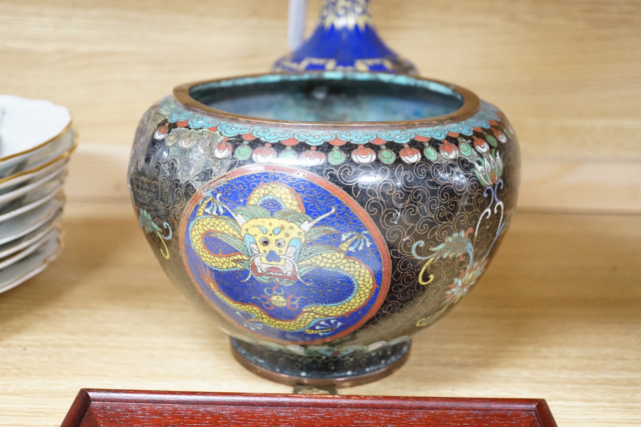 A Chinese framed ceramic plaque, a Chinese cloisonné enamel vase and bowl, plaque 30cms high x 15cms wide